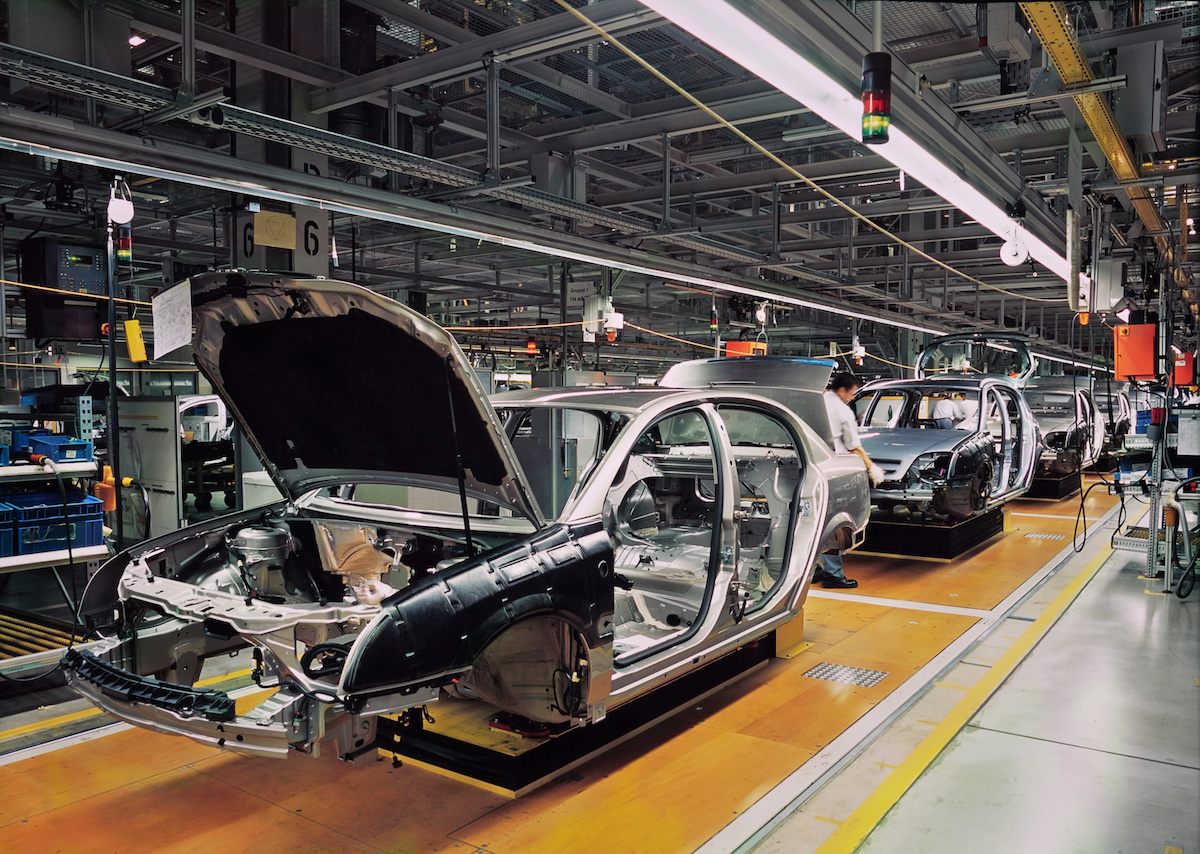 Car assembly line with unfinished cars