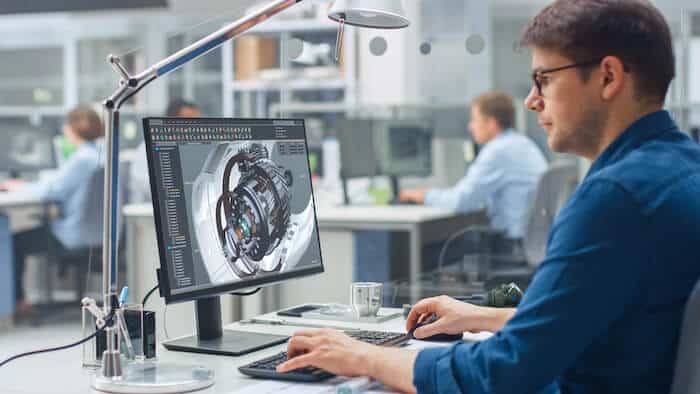 Product design sketches: engineer using a computer
