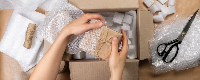 Entrepreneur packing an order