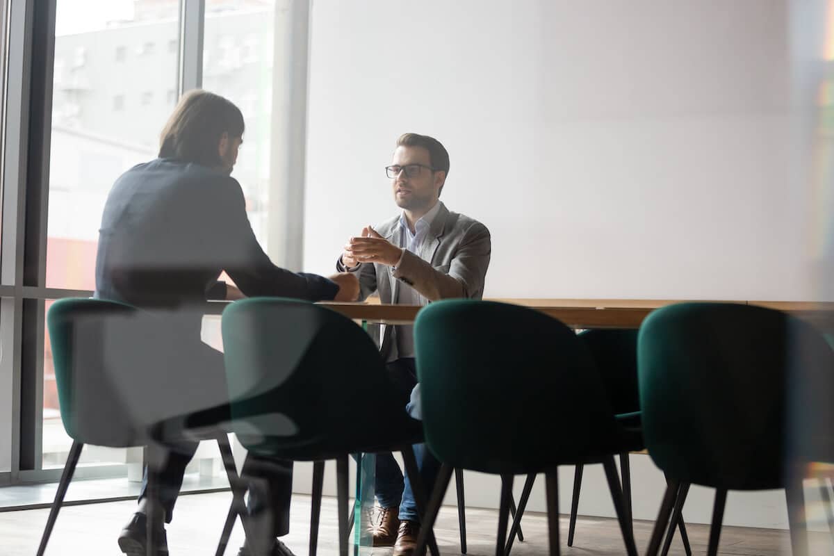Person interviewing a sourcing agent