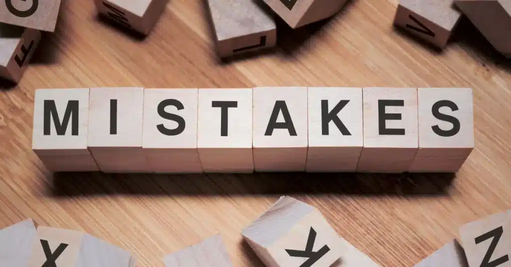 Patent vs trademark vs copyright mistakes illustrated with wooden blocks spelling mistakes in a branding and IP strategy context